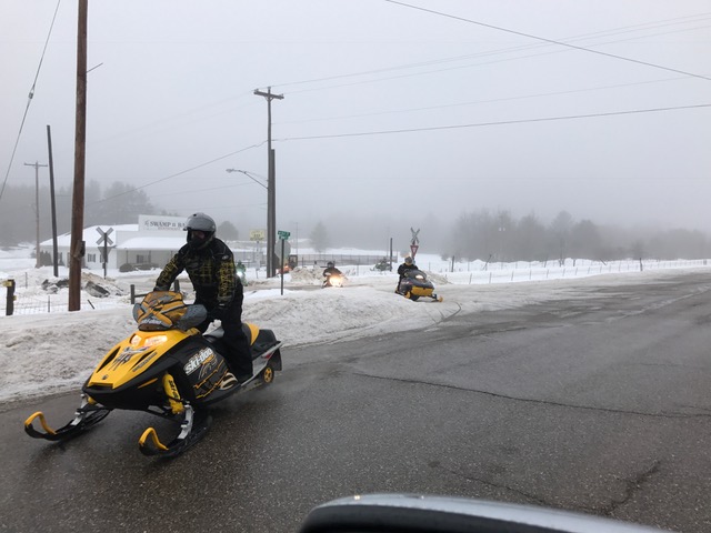 sleds wed morn in Frederic @ gas station