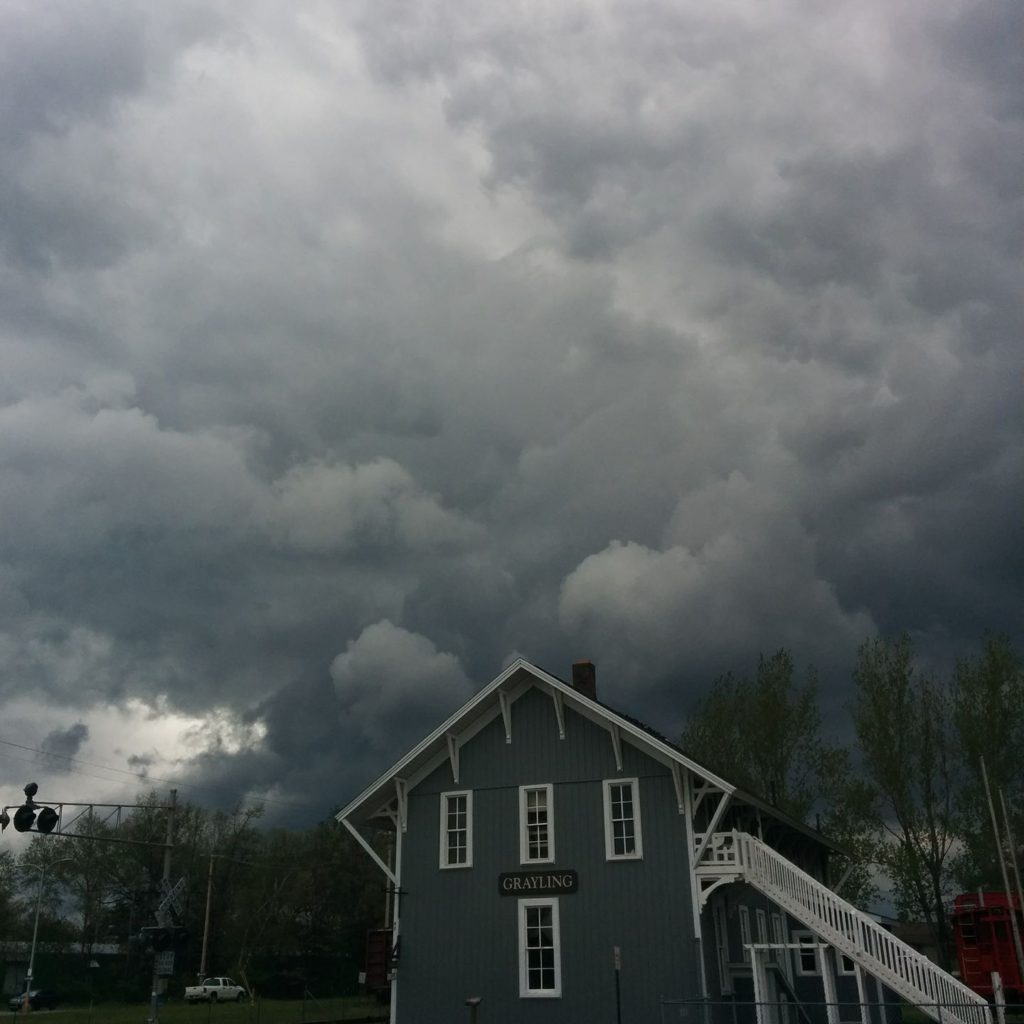 Storm over the old Grayling RR Depot, photo by Krys Lobsinger